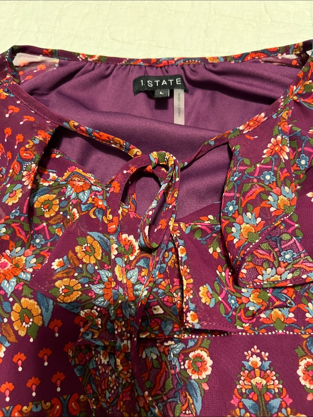 1.STATE Plum Floral Tie-Neck Top